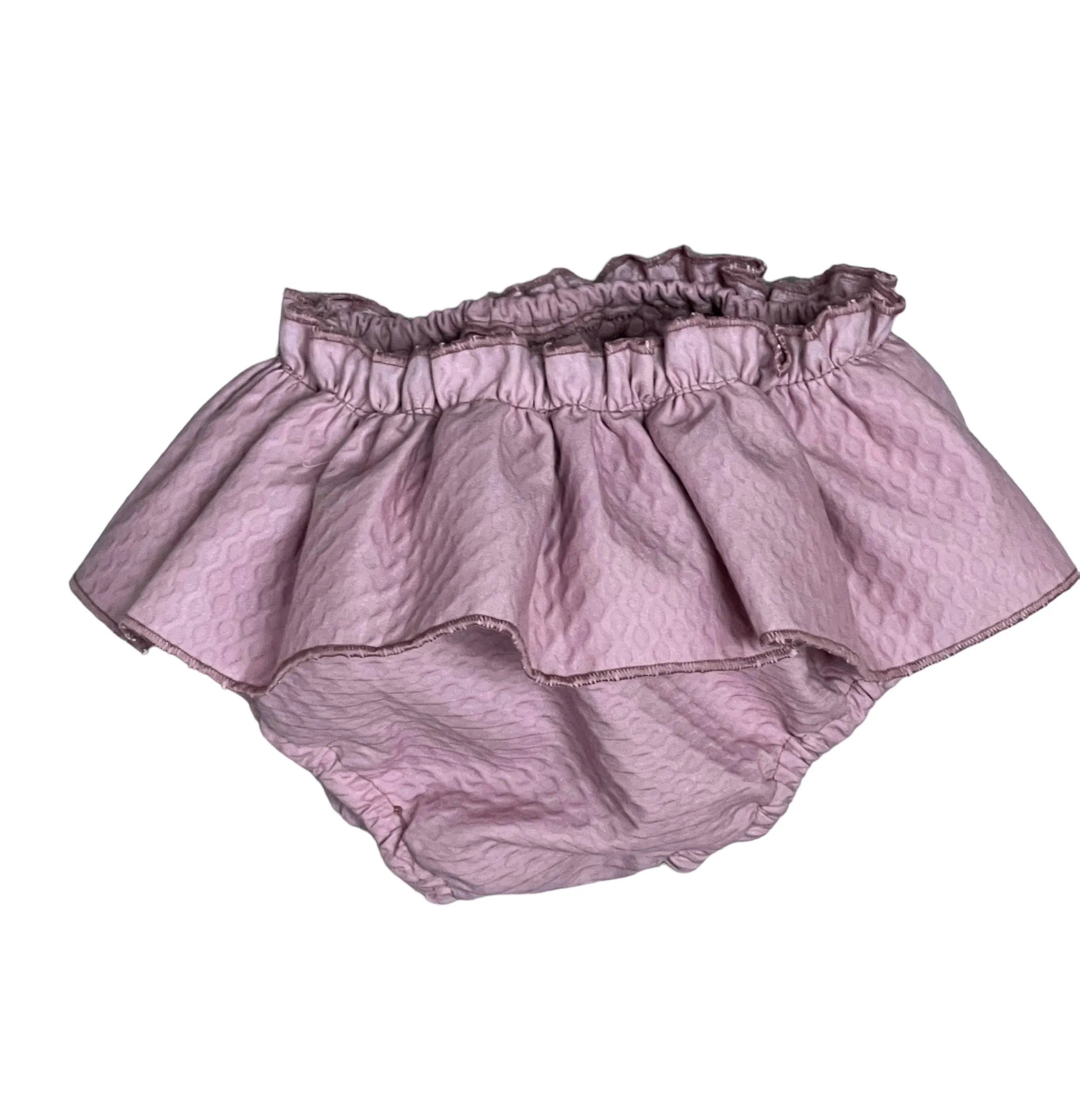 Powder pink piqué panties with ruffles.