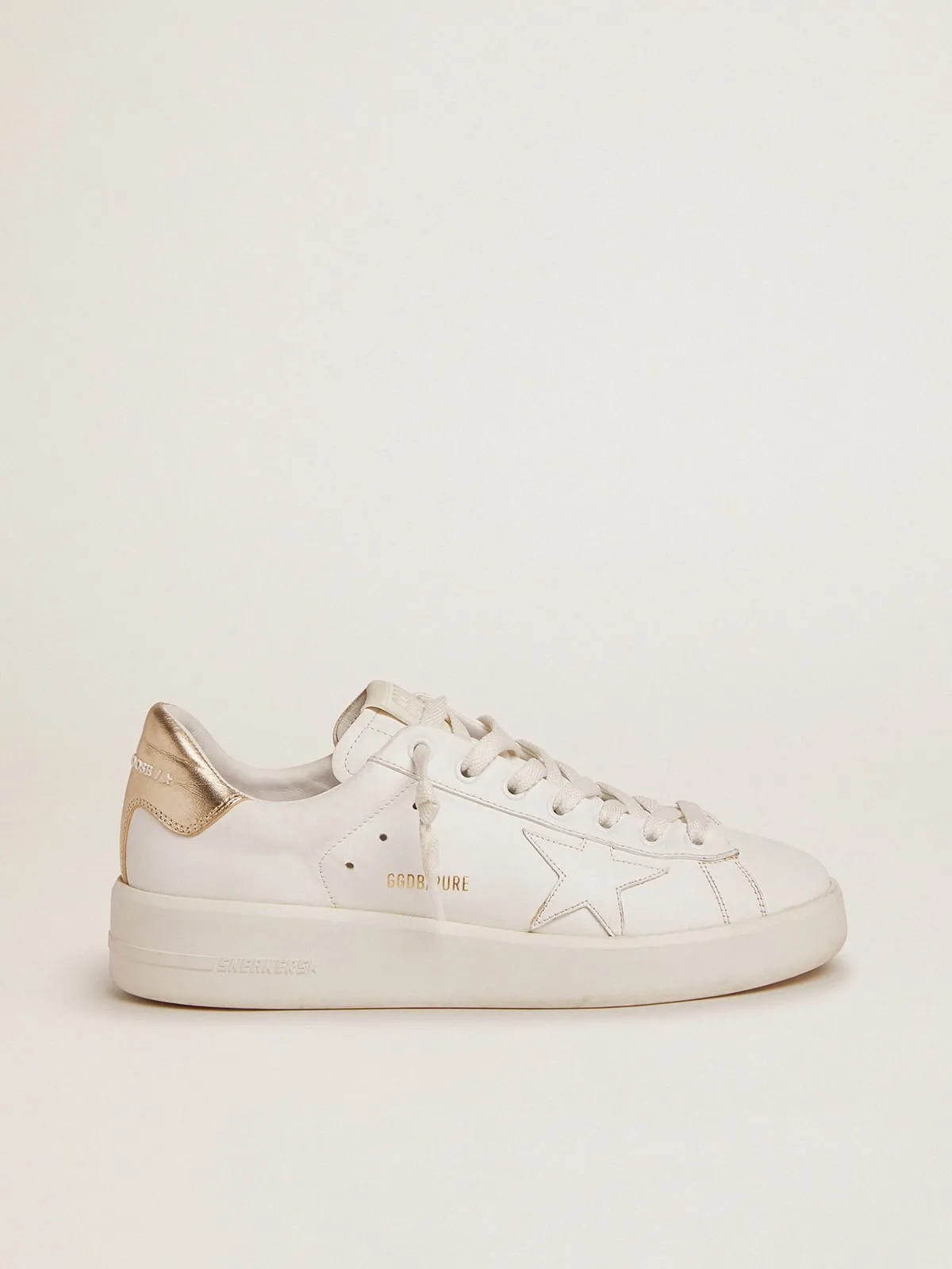 Sneakers Purestar mujer con refuerzo del talón dorado